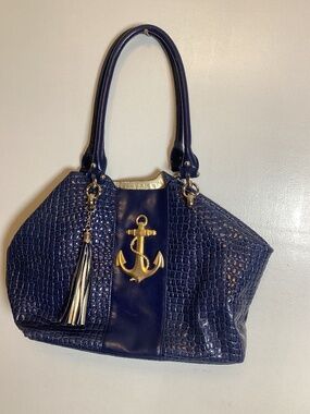 Bosom Buddy faux croc leather tote bag with large metal anchor with tassels